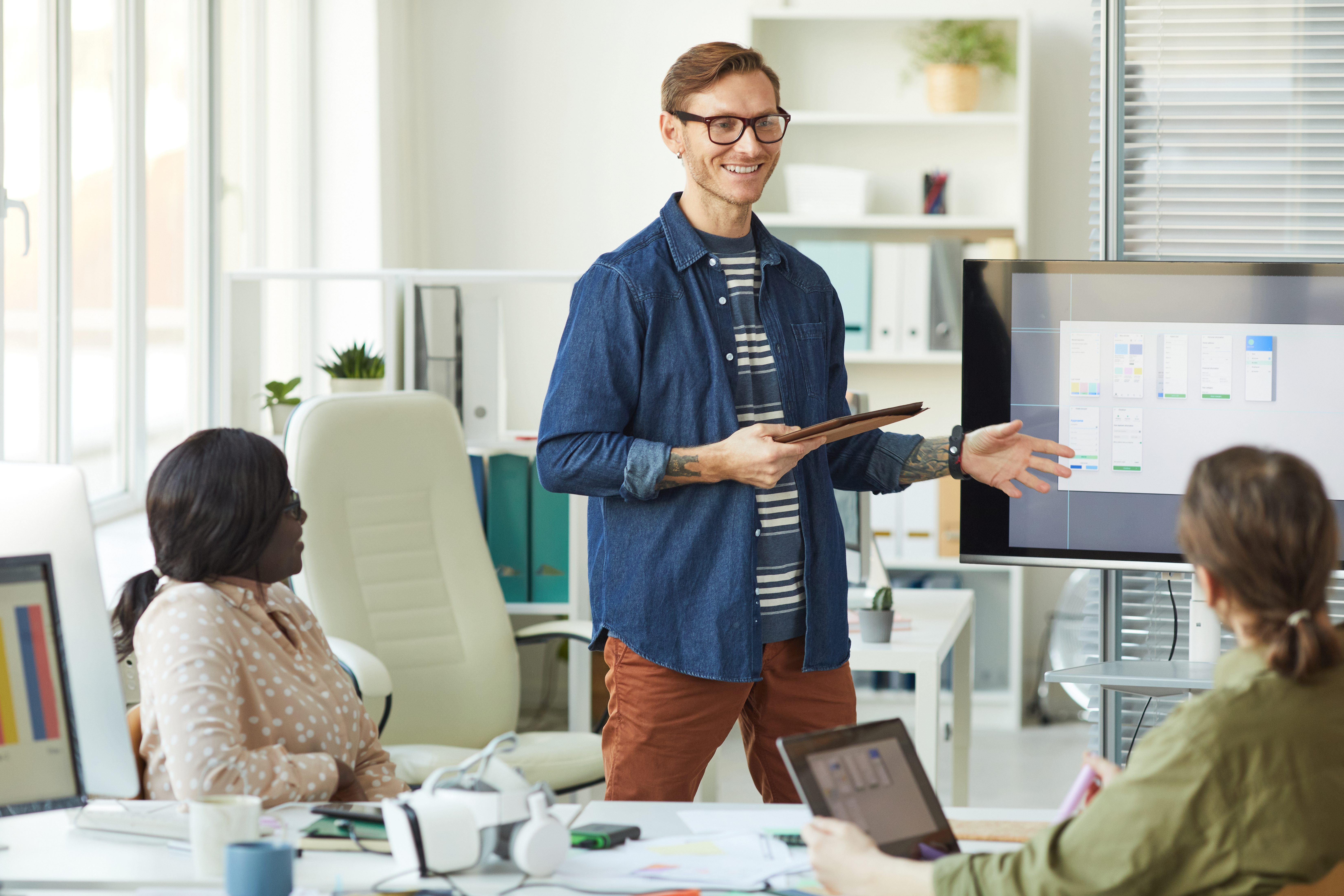 office technology solutions showing a man presenting 